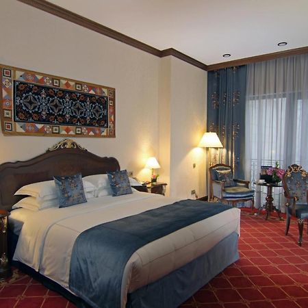 Orion Hotel Bishkek Exterior photo A room at the hotel