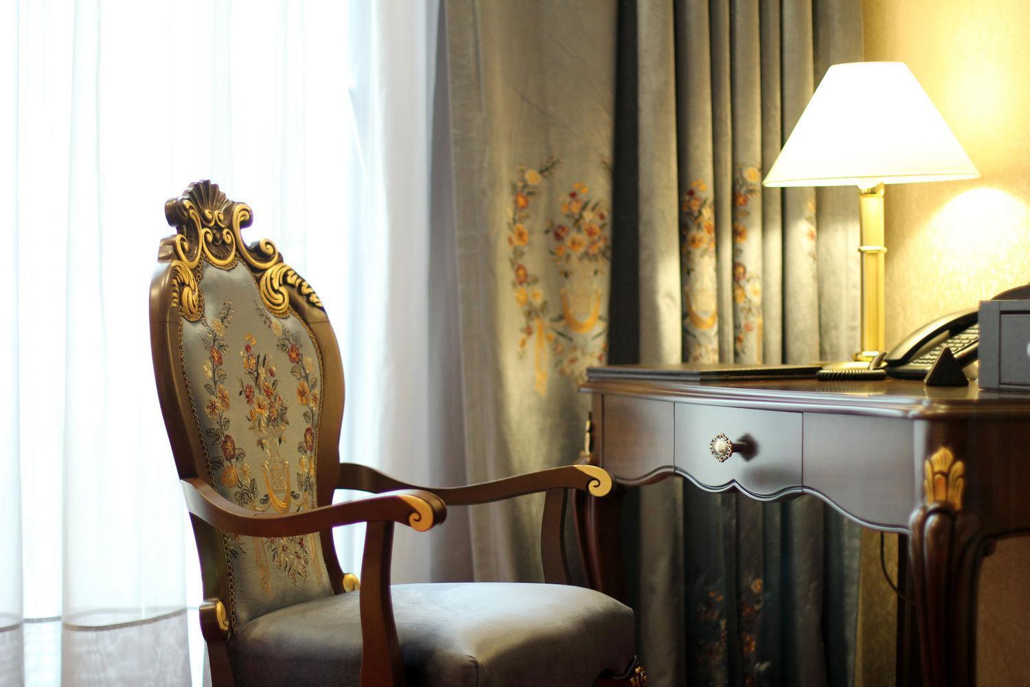 Orion Hotel Bishkek Exterior photo A chair