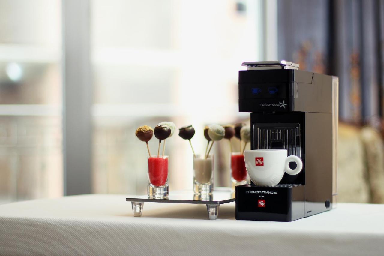 Orion Hotel Bishkek Exterior photo A Nespresso Vertuoline coffee machine