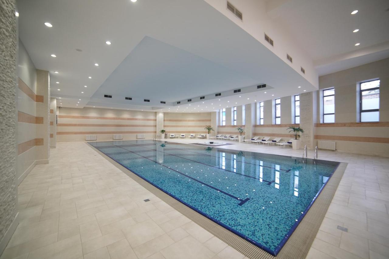 Orion Hotel Bishkek Exterior photo Swimming pool