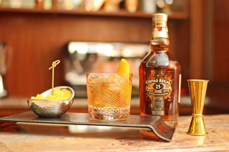 Orion Hotel Bishkek Exterior photo A bottle of 25 year old Chivas Regal