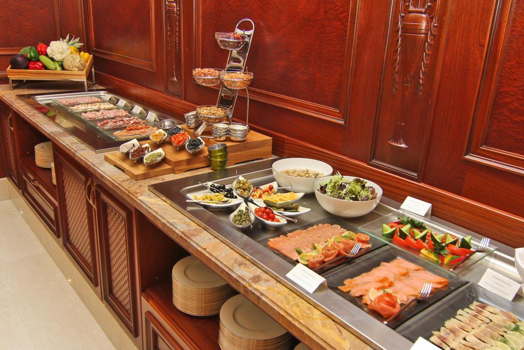 Orion Hotel Bishkek Exterior photo A buffet