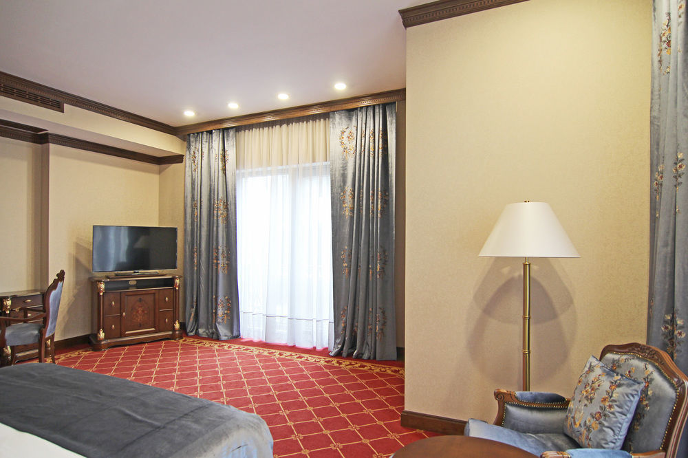 Orion Hotel Bishkek Exterior photo A room at the hotel