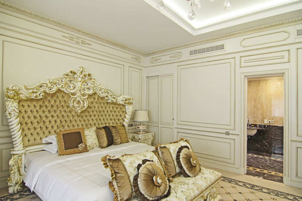 Orion Hotel Bishkek Exterior photo A bedroom in the hotel
