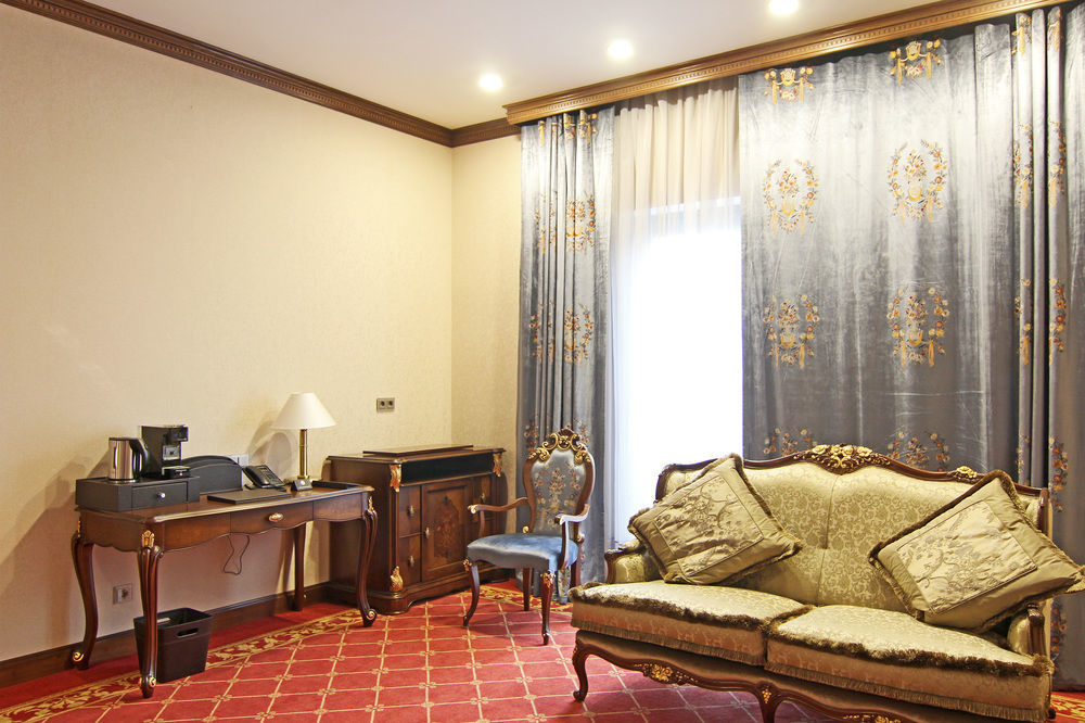 Orion Hotel Bishkek Exterior photo A room at the hotel
