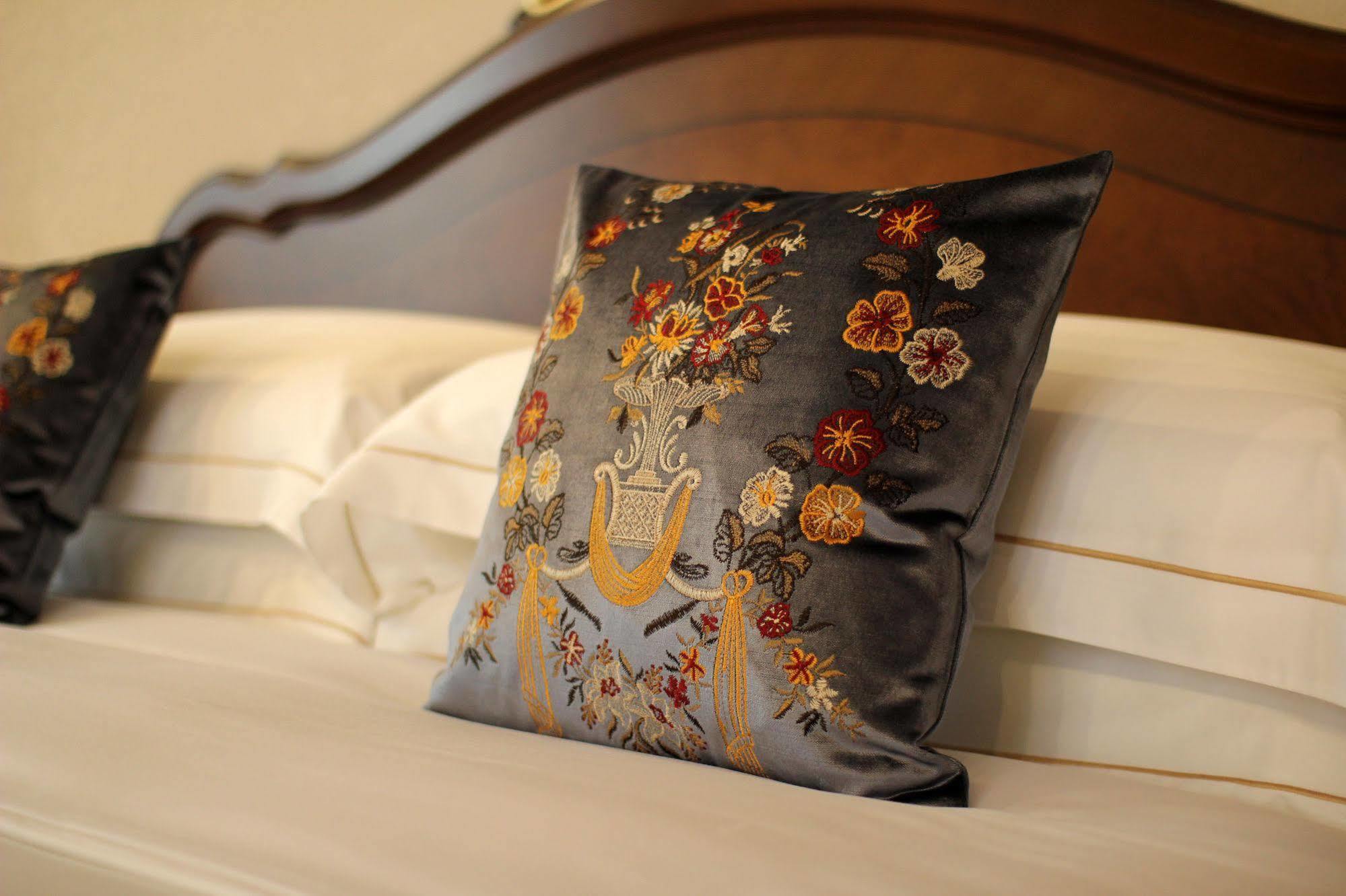 Orion Hotel Bishkek Exterior photo A cushion